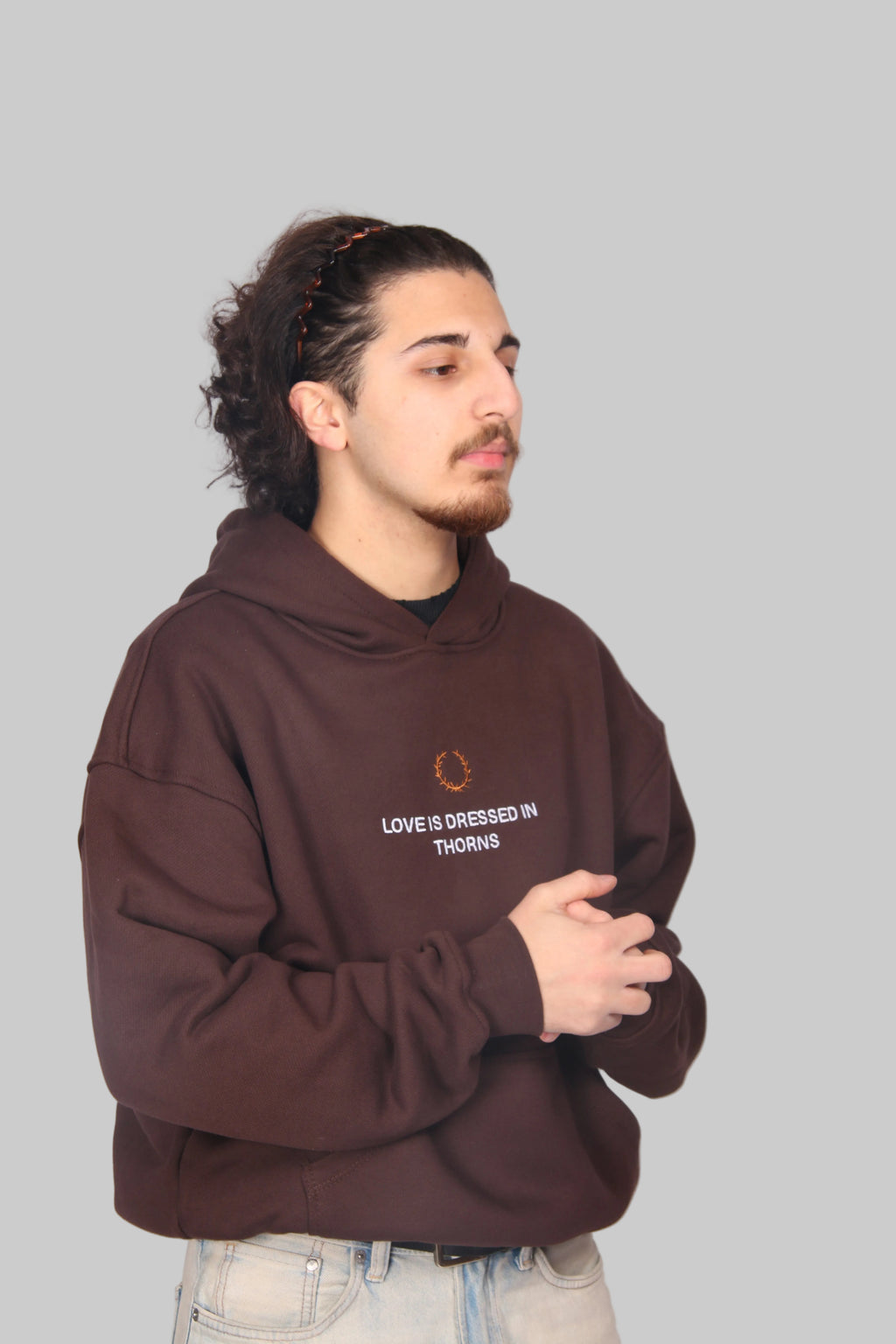 Love is dressed in Thorns Hoodie