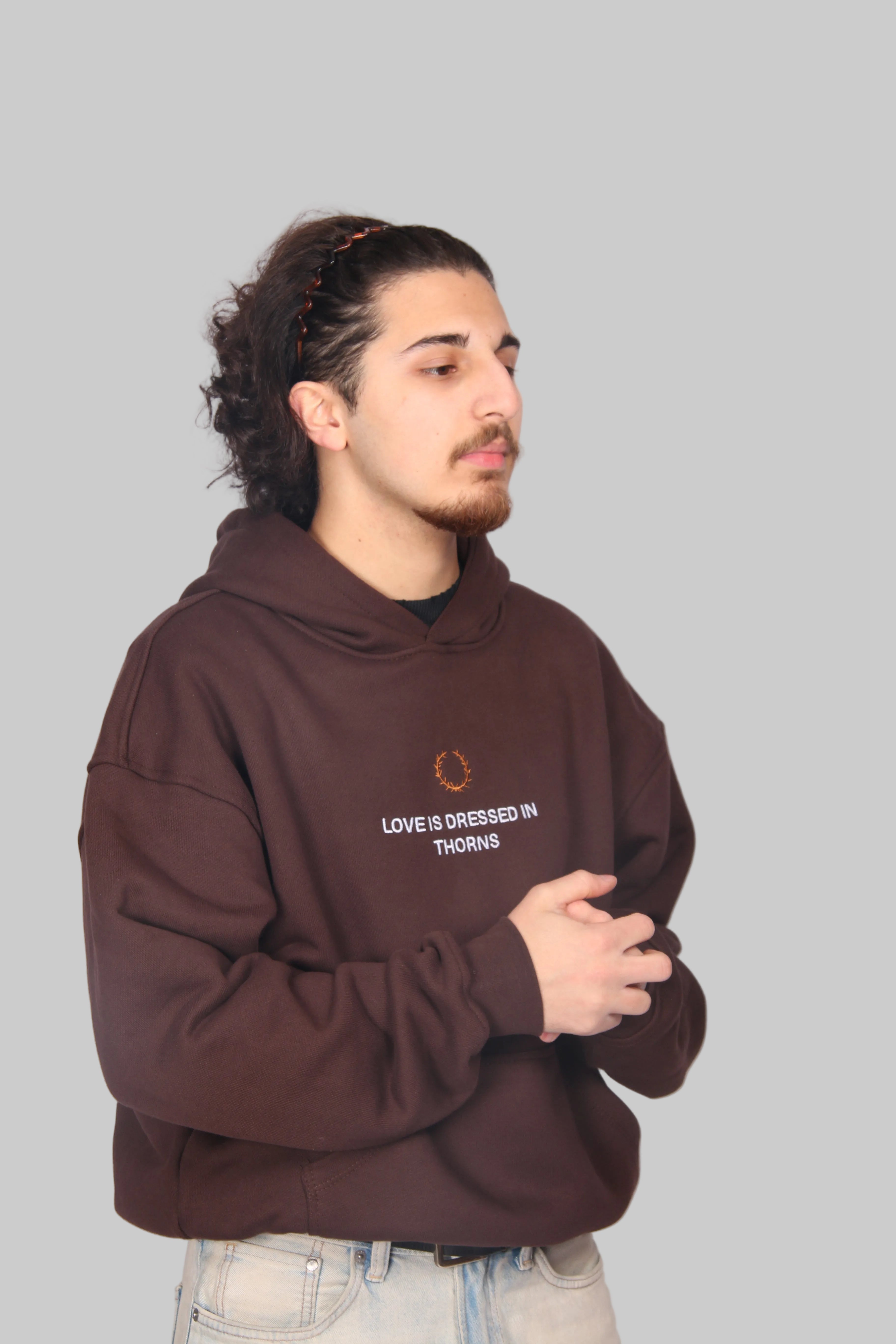 Love is dressed in Thorns Hoodie