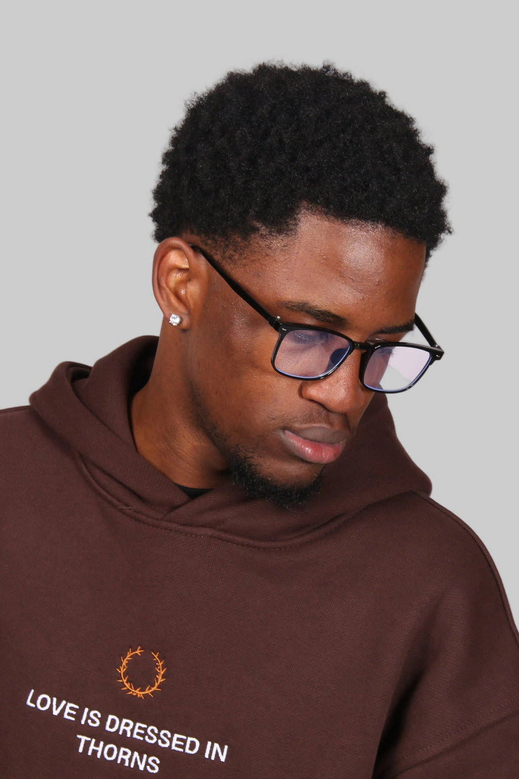 Love is dressed in Thorns Hoodie